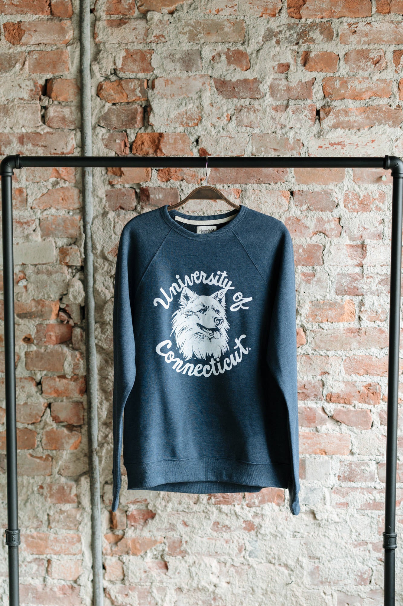 Show Your UConn Pride with Vintage Husky Logo Crewneck