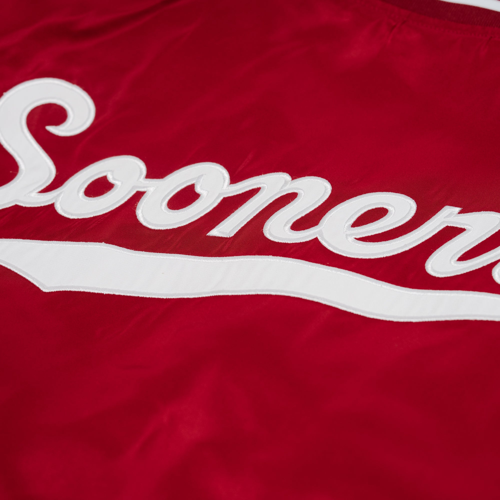 Show Your OU Pride with the Oklahoma Sooners Vintage Script Bomber Jacket