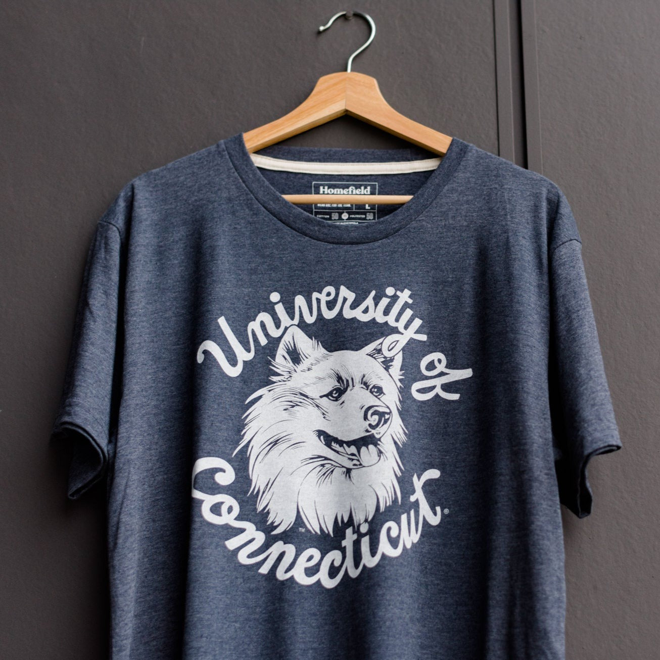 Nostalgic UConn Husky Logo Tee - A Tribute to the Past