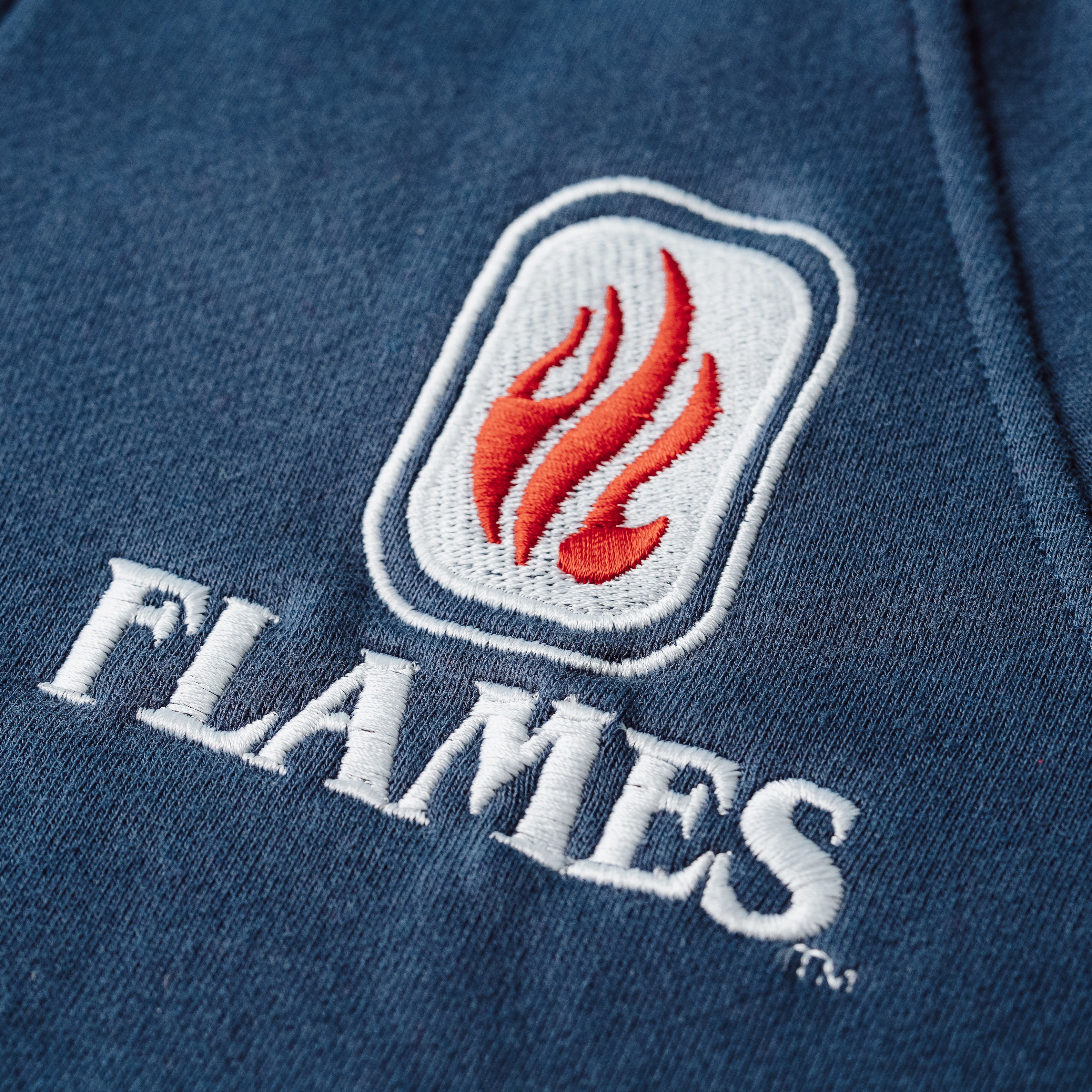 Relive the 80s with UIC Flames Vintage Logo Quarter Zip