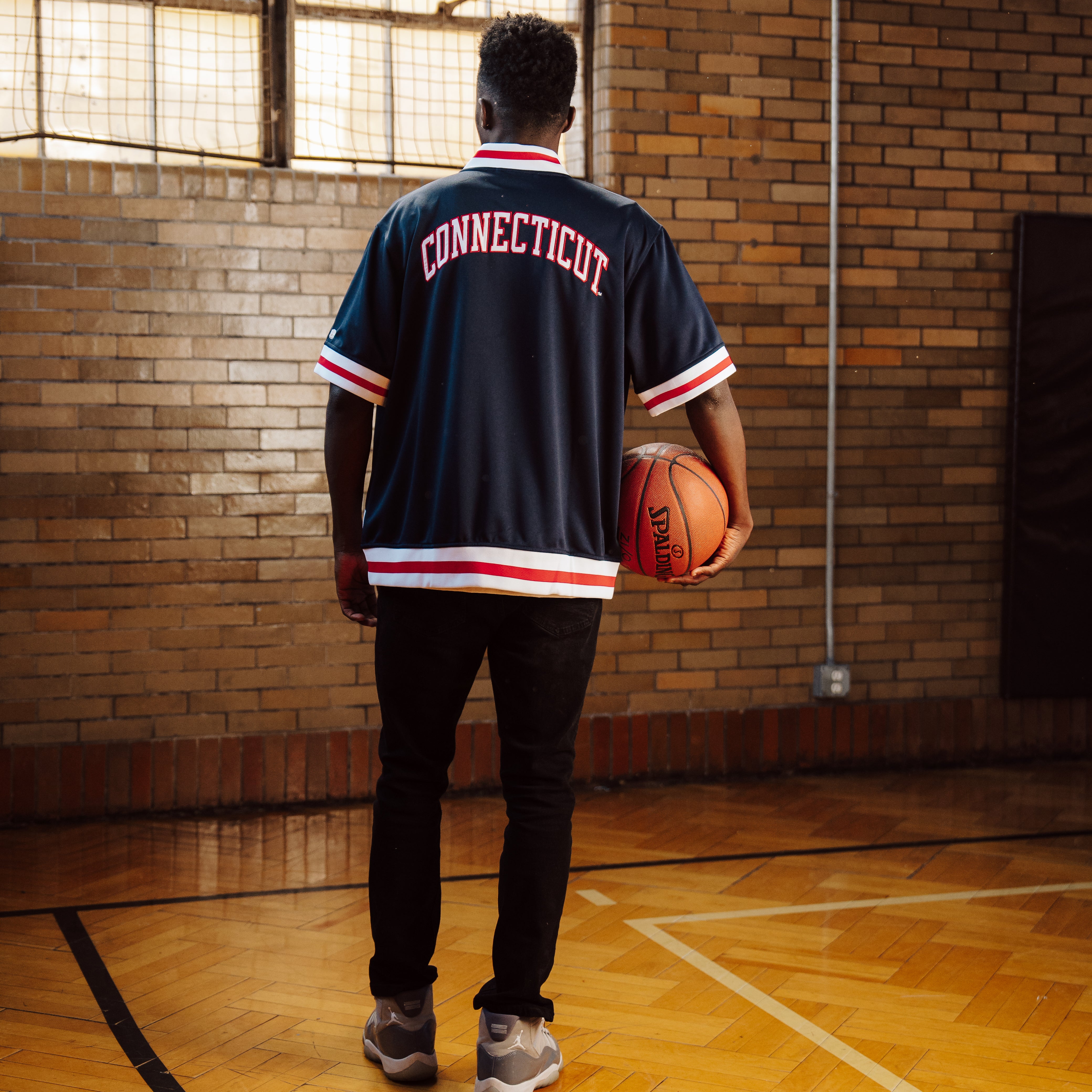 Relive the Glory: UConn Men's 1990 Vintage Basketball Shooting Shirt