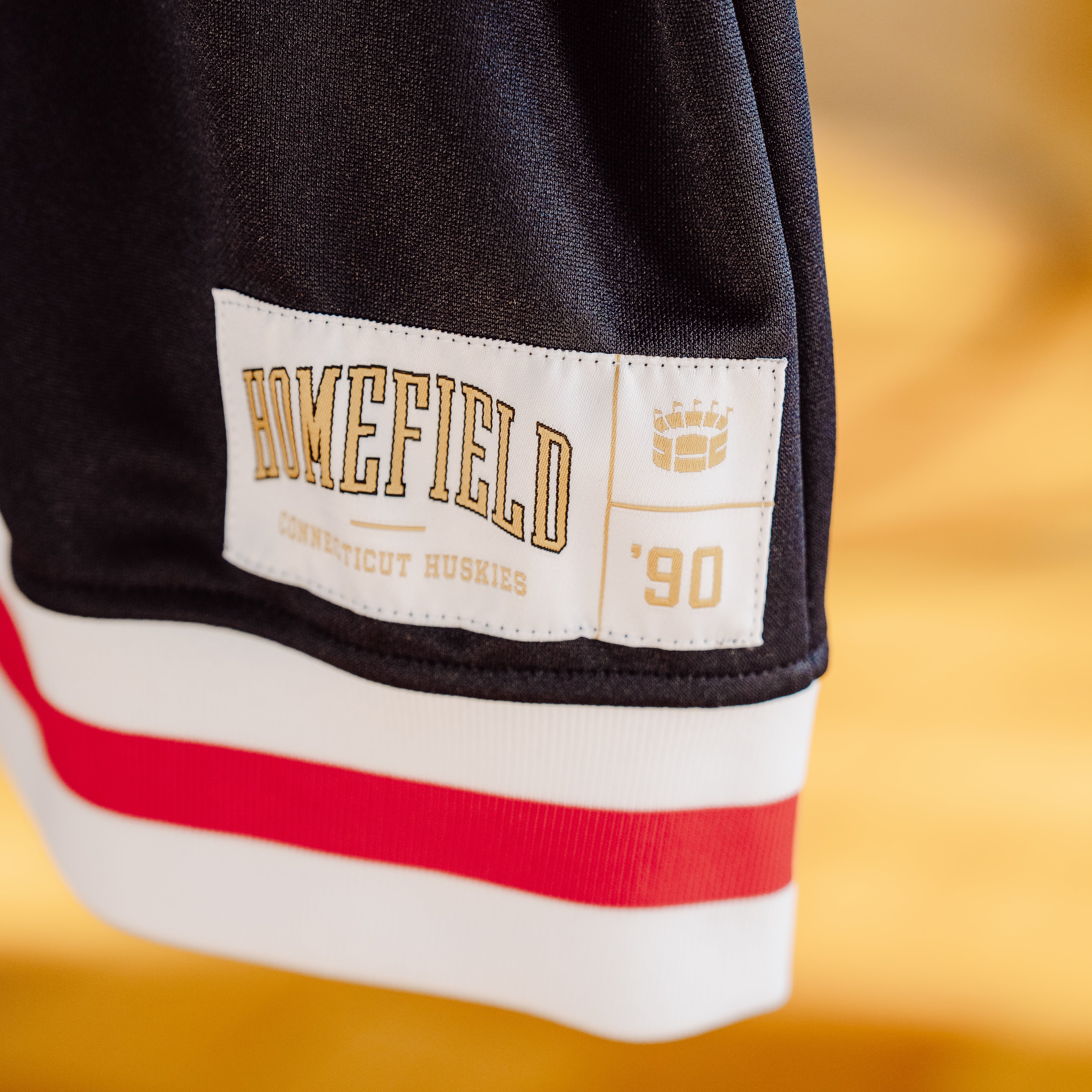 Relive the Glory: UConn Men's 1990 Vintage Basketball Shooting Shirt